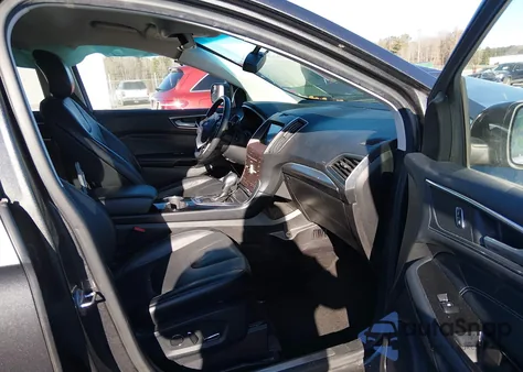 2017 Ford Edge Titanium z USA, uszkodzony, nr VIN 2FMPK4K88HBC07356